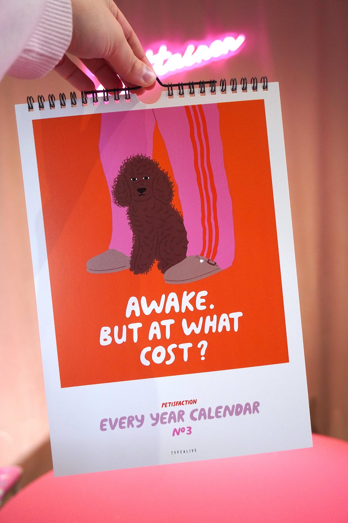 Vuosikalenteri "Awake. But at what cost?"